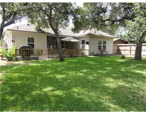 a front view of house with yard and sitting area