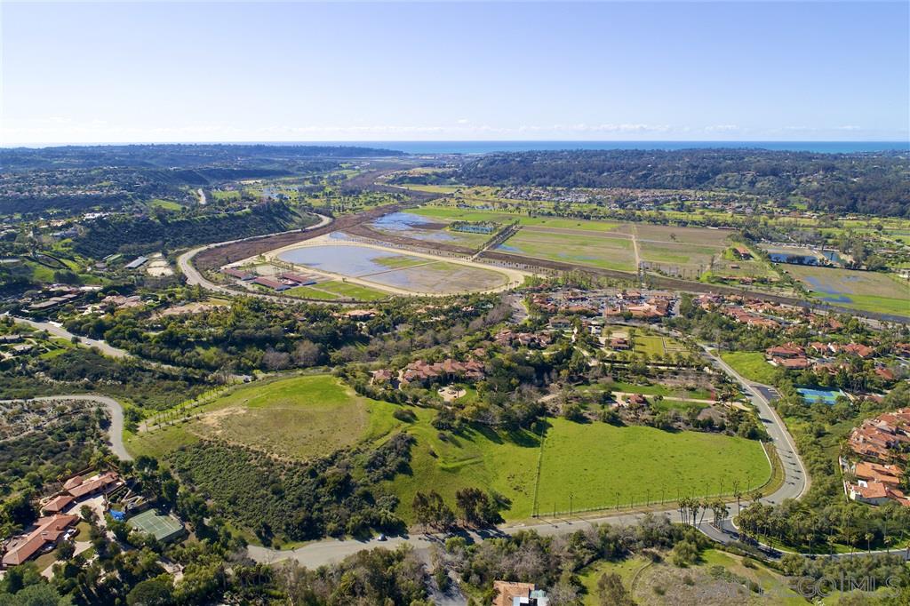 5872 Rancho Diegueno Road Del Mar, CA 92014 - Photo 2 of 13 a view of a city with an ocean