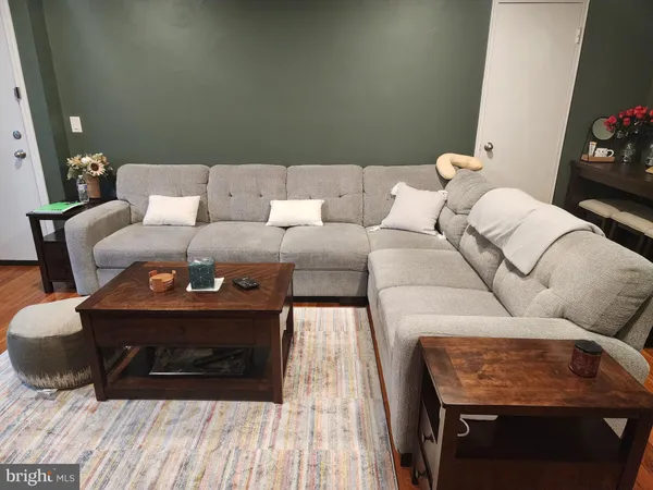 a living room with furniture and a couch