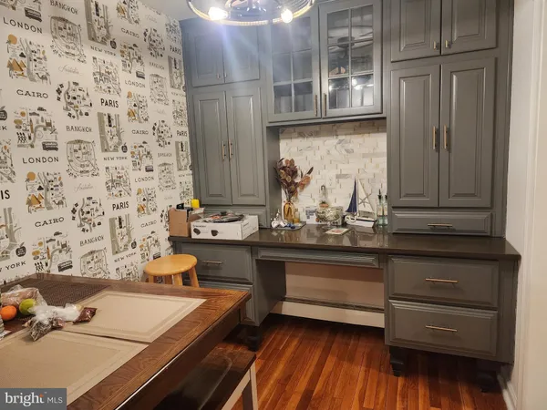 a bathroom with a bathtub and a sink