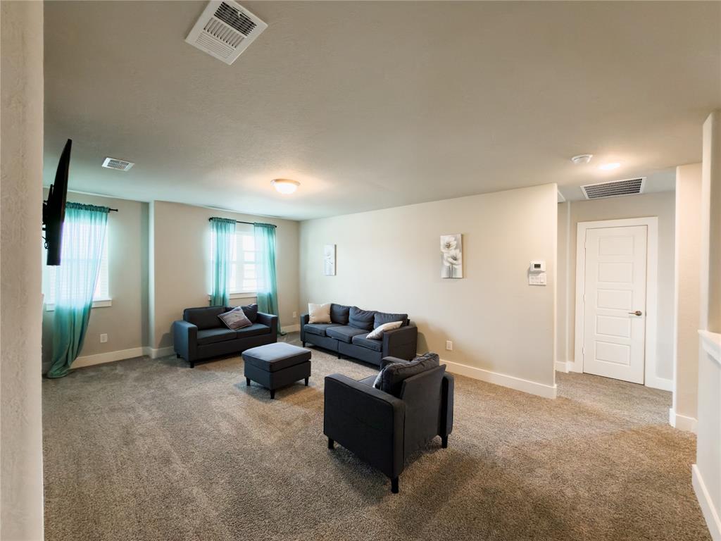 113 Nathan Drive Princeton, TX 75407 - Photo 20 of 40 a living room with furniture