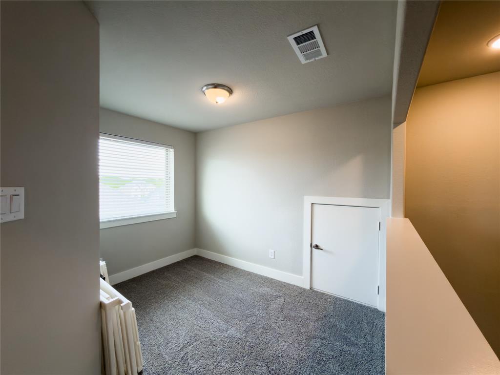 113 Nathan Drive Princeton, TX 75407 - Photo 21 of 40 an empty room with windows