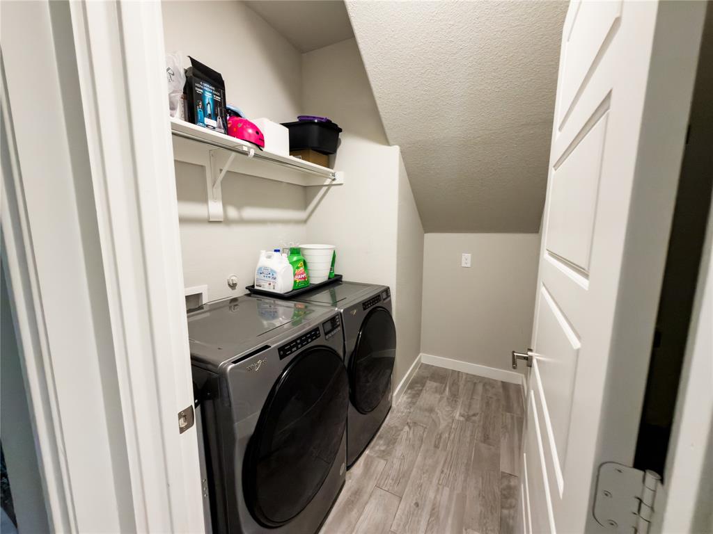 113 Nathan Drive Princeton, TX 75407 - Photo 32 of 40 a utility room with dryer and washer