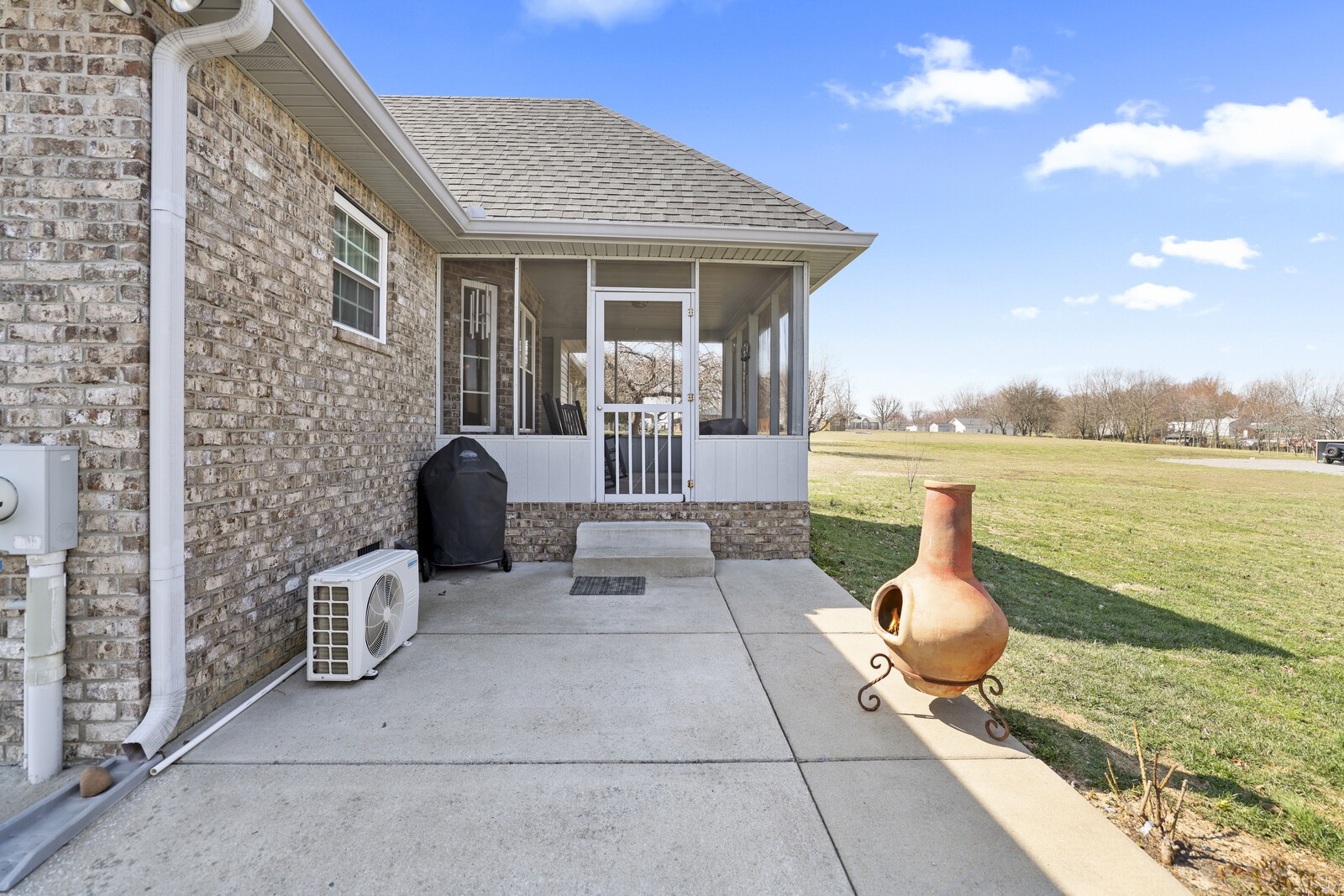 338 North Centerpoint Road Portland, TN 37148 - Photo 54 of 71 a front view of a house with outdoor seating yard and mountain view in back