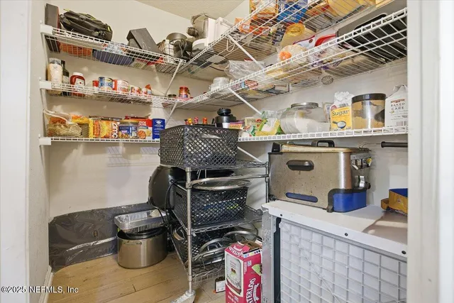 a kitchen with a stove and cabinets