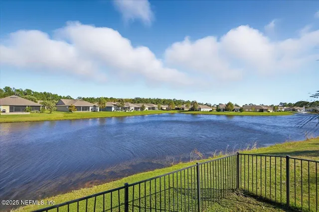 a view of a city and lake
