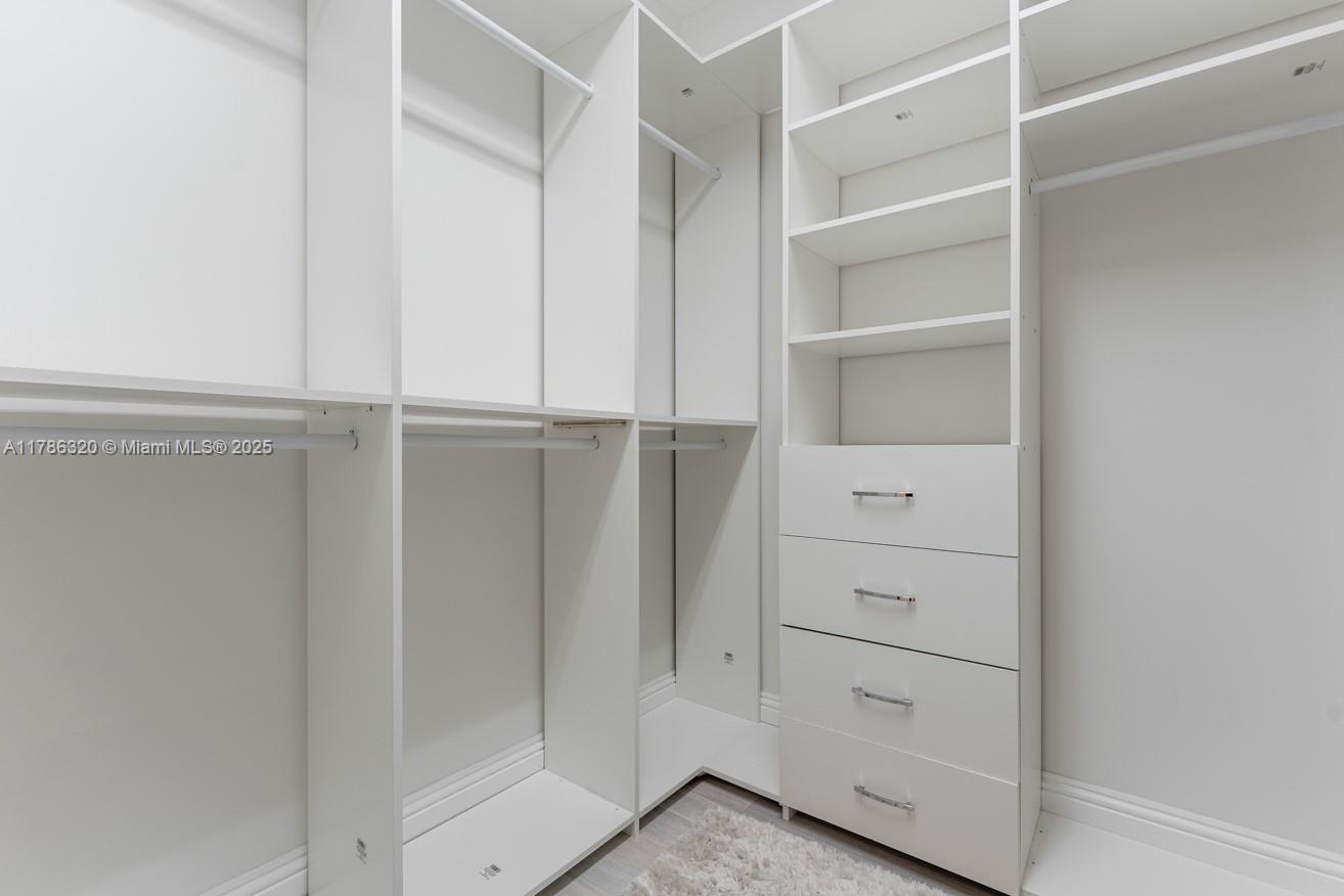 17937 Villa Club Way Boca Raton, FL 33496 - Photo 22 of 41 a view of an empty walk in closet