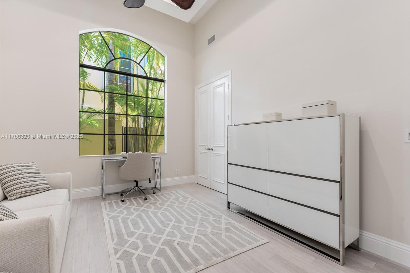 17937 Villa Club Way Boca Raton, FL 33496 - Photo 26 of 41 a living room with a large window