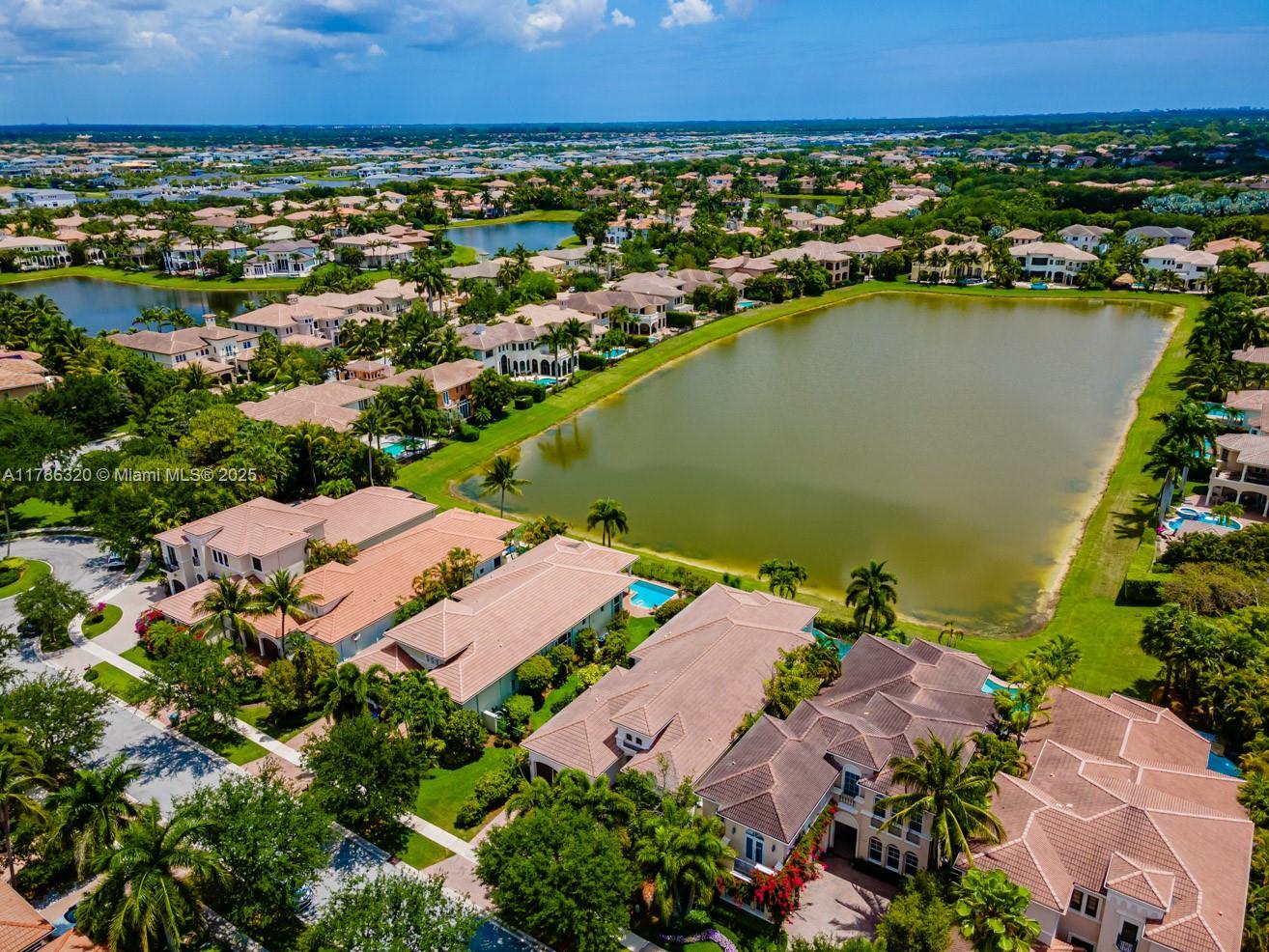 17937 Villa Club Way Boca Raton, FL 33496 - Photo 3 of 41 an aerial view of ocean and residential houses with outdoor space