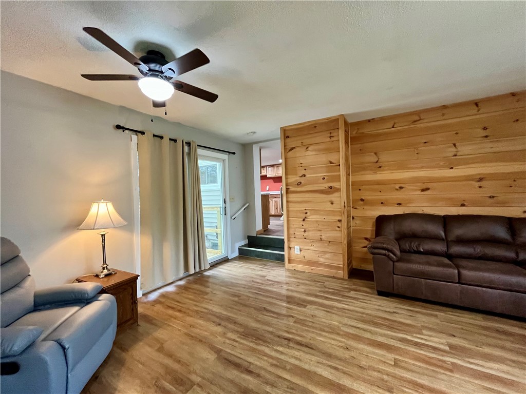 558 Sterling Station Road Sterling, NY 13143 - Photo 26 of 45 Spacious living room and sliding glass door leading to the deck
