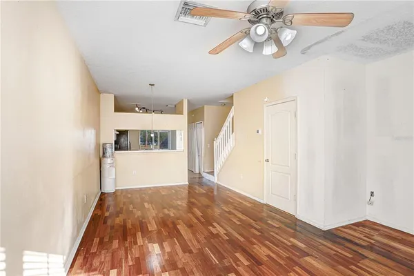 a view of a livingroom with wooden floor
