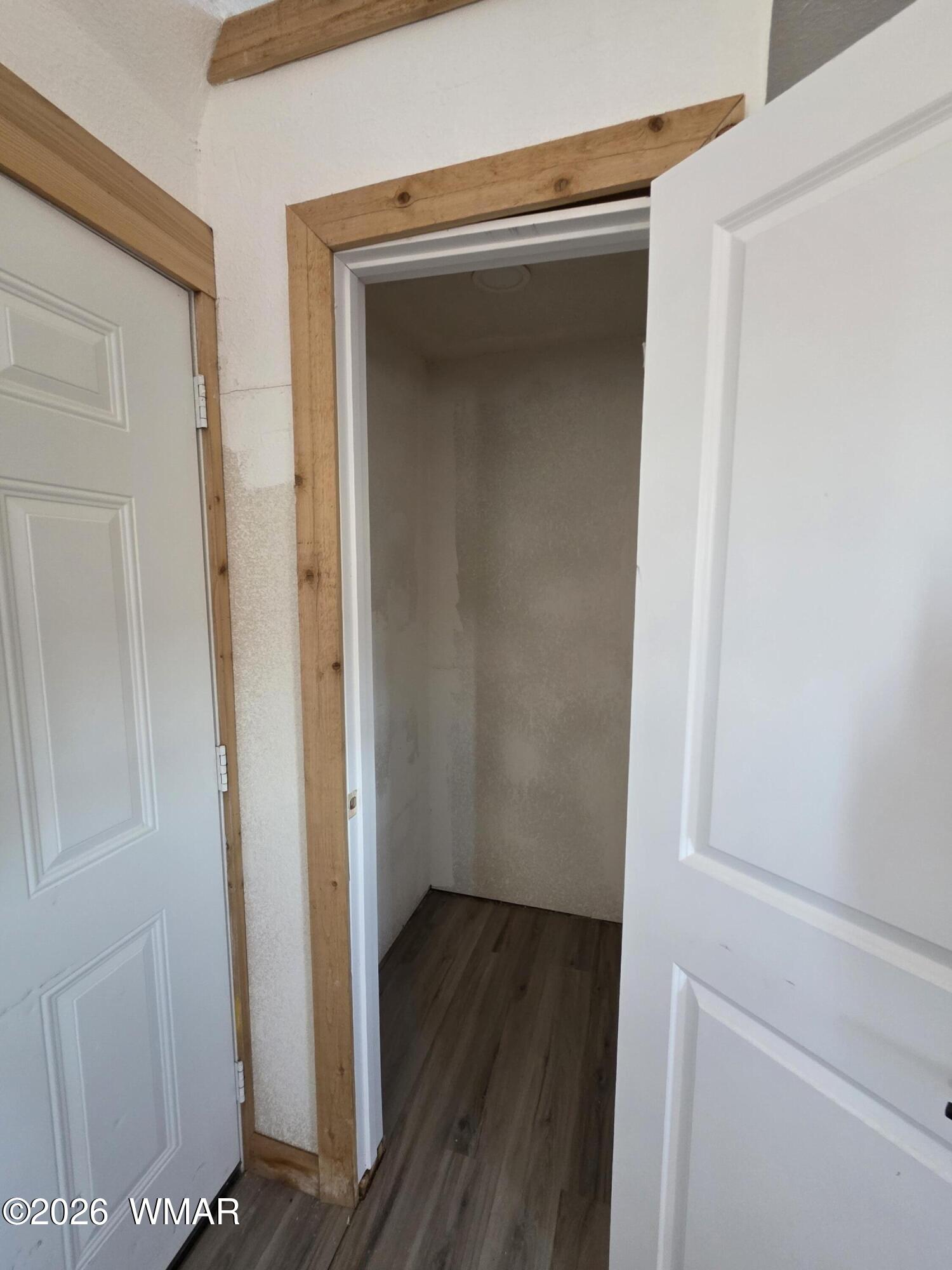 5057 Churchill Road Snowflake, AZ 85937 - Photo 102 of 115 a view of a hallway with wooden floor