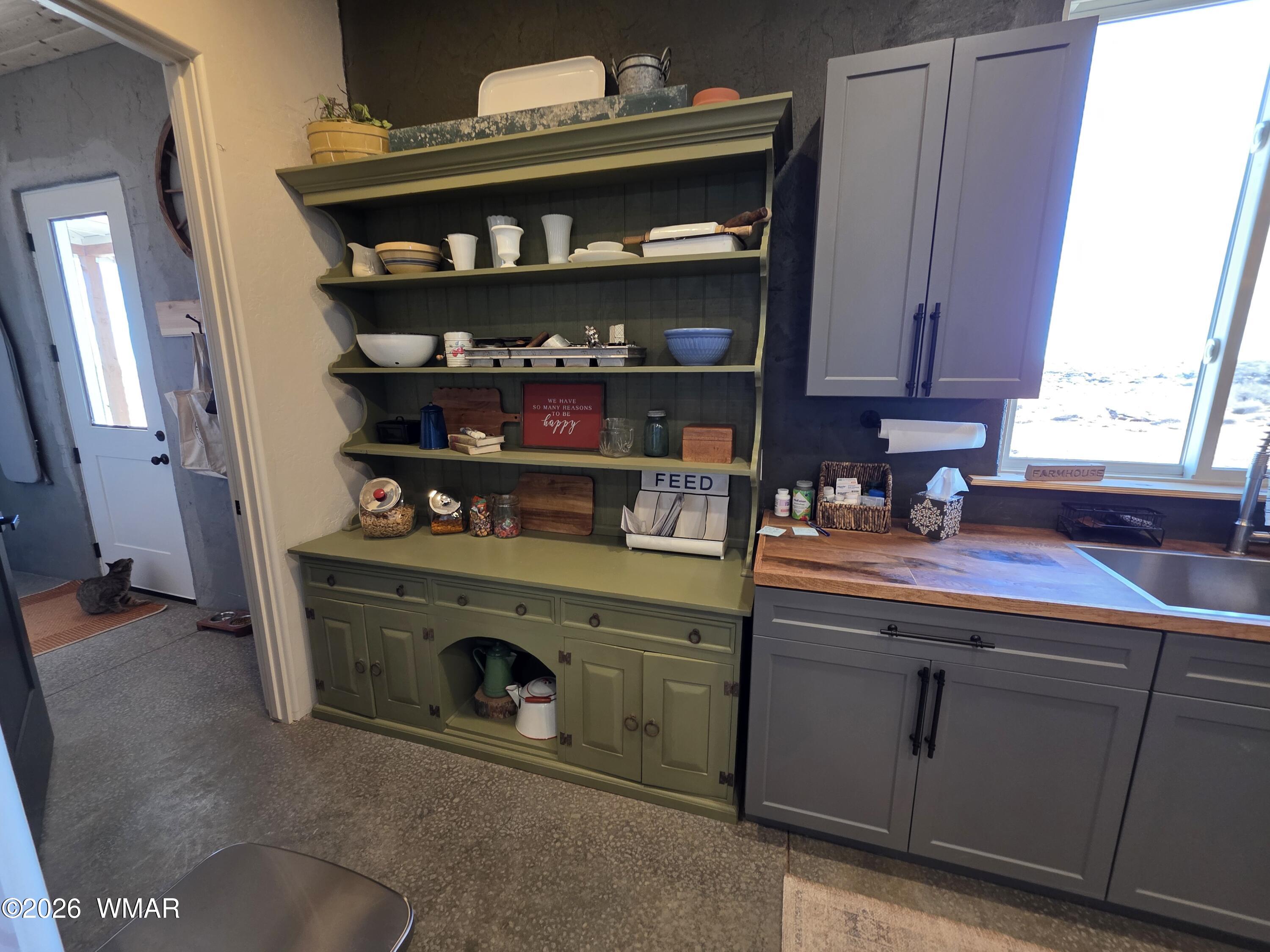 5057 Churchill Road Snowflake, AZ 85937 - Photo 25 of 115 a kitchen with stainless steel appliances granite countertop a stove and a microwave