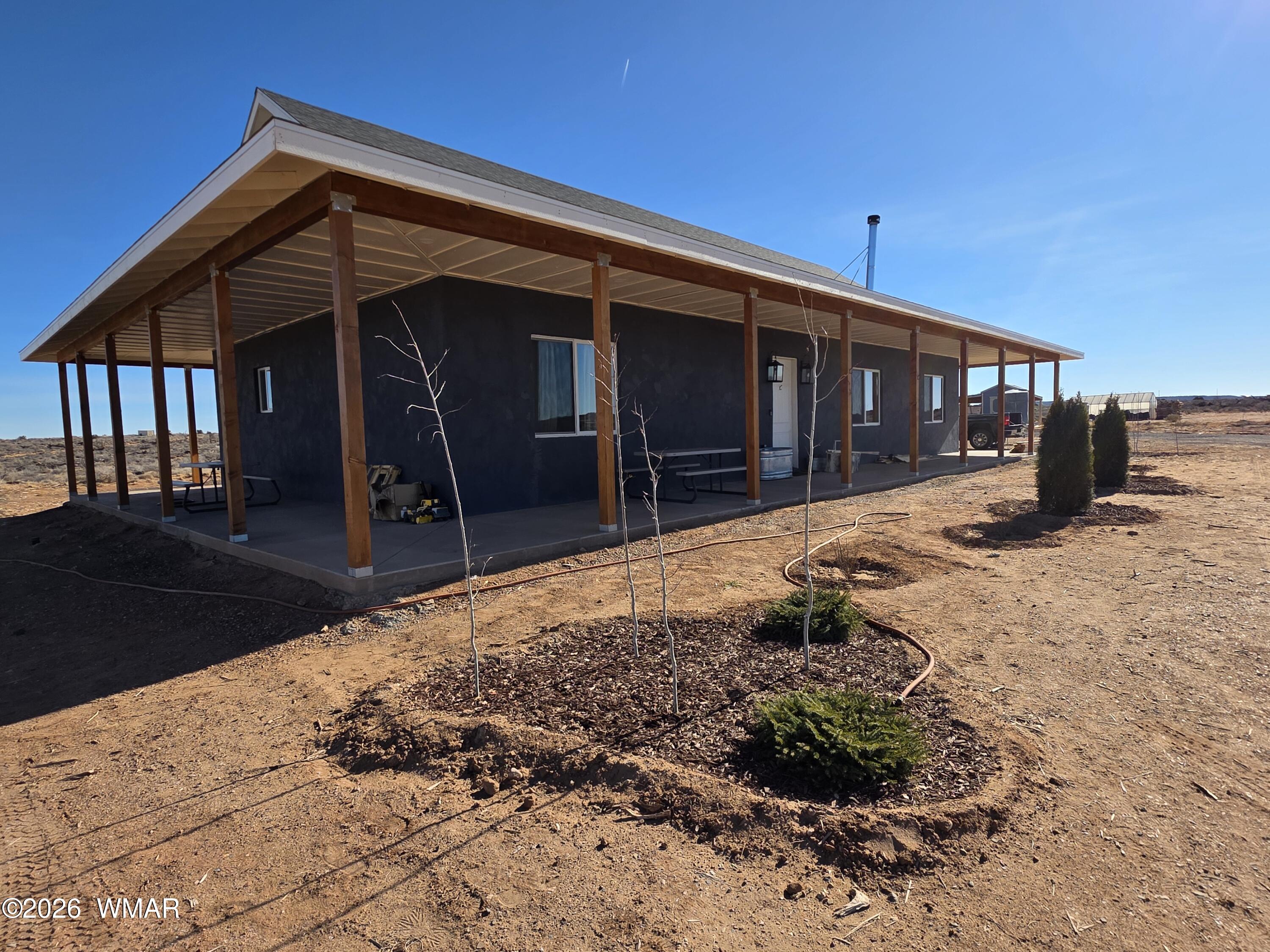 5057 Churchill Road Snowflake, AZ 85937 - Photo 3 of 115 a front view of a house with a yard