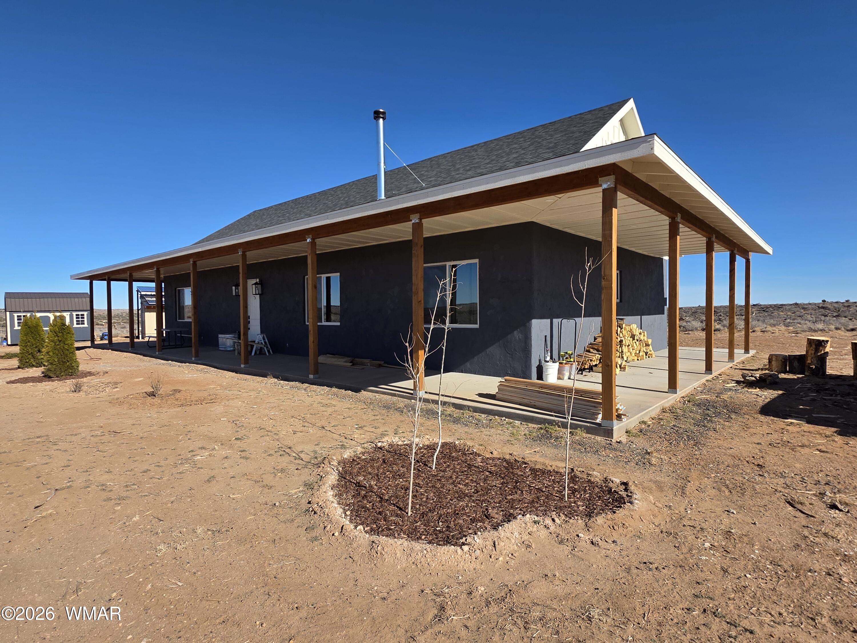 5057 Churchill Road Snowflake, AZ 85937 - Photo 5 of 115 a view of a house with a patio