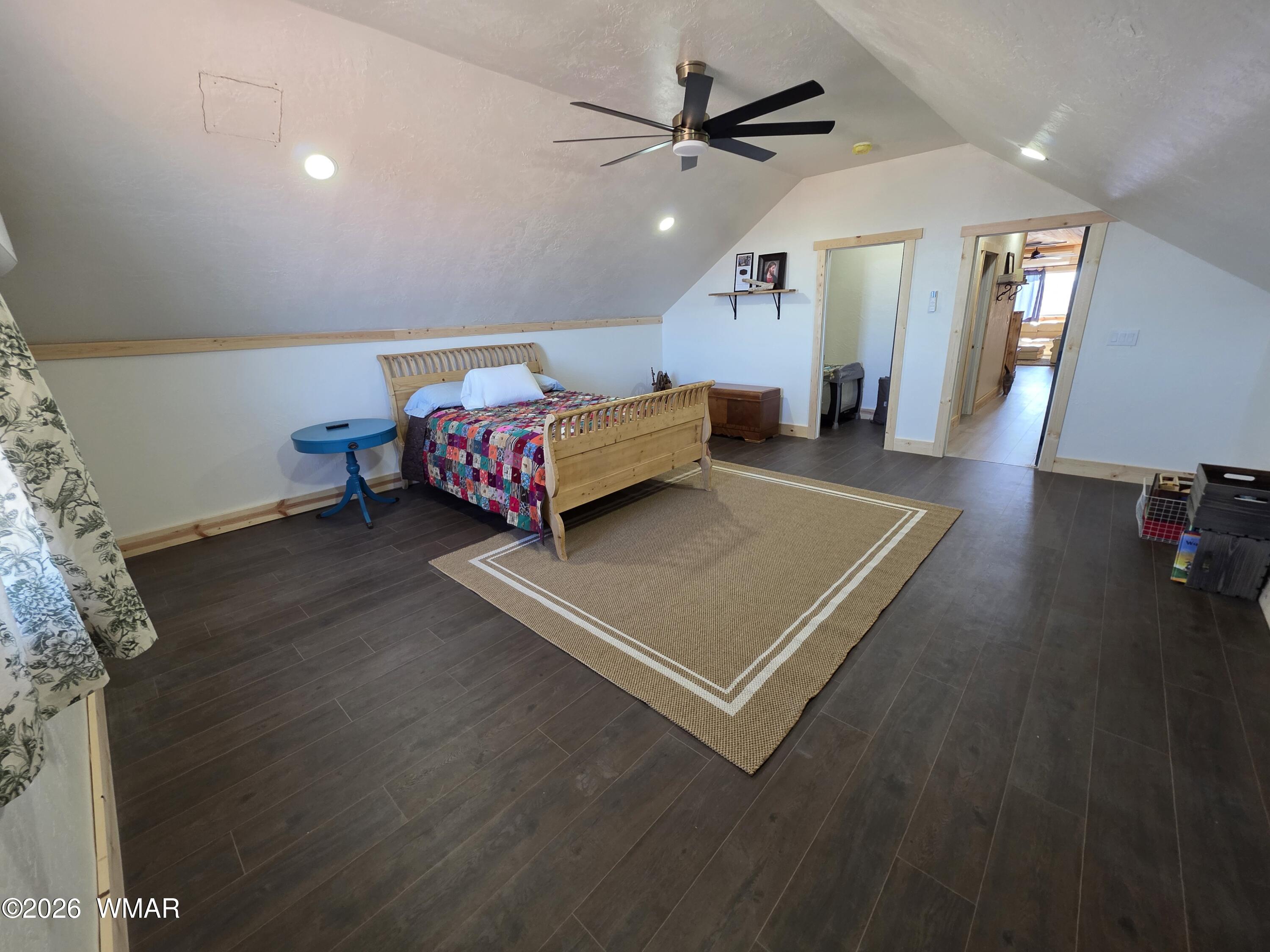 5057 Churchill Road Snowflake, AZ 85937 - Photo 59 of 115 a living room with hard wood floors and a table