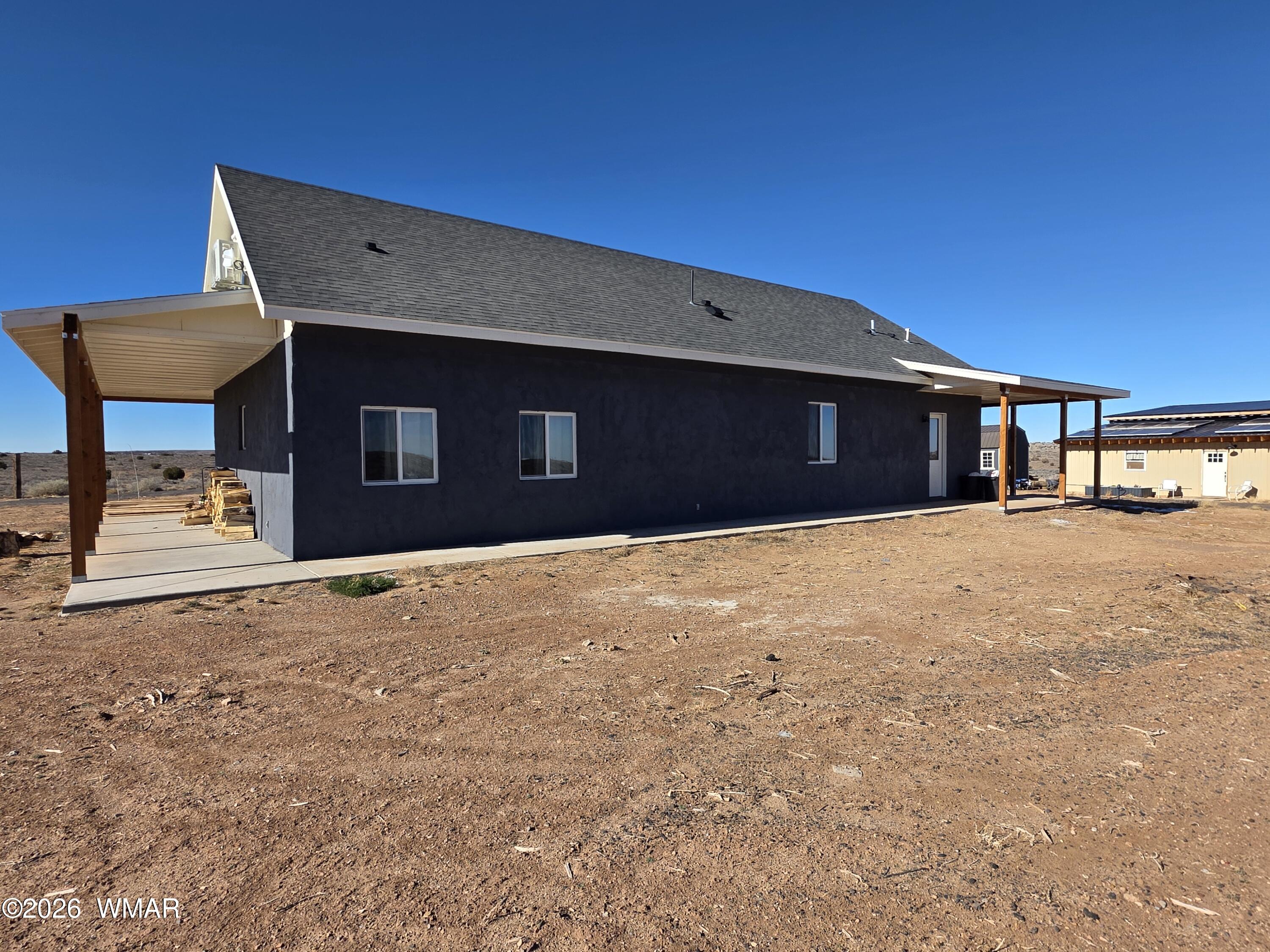 5057 Churchill Road Snowflake, AZ 85937 - Photo 7 of 115 a front view of a building with a road