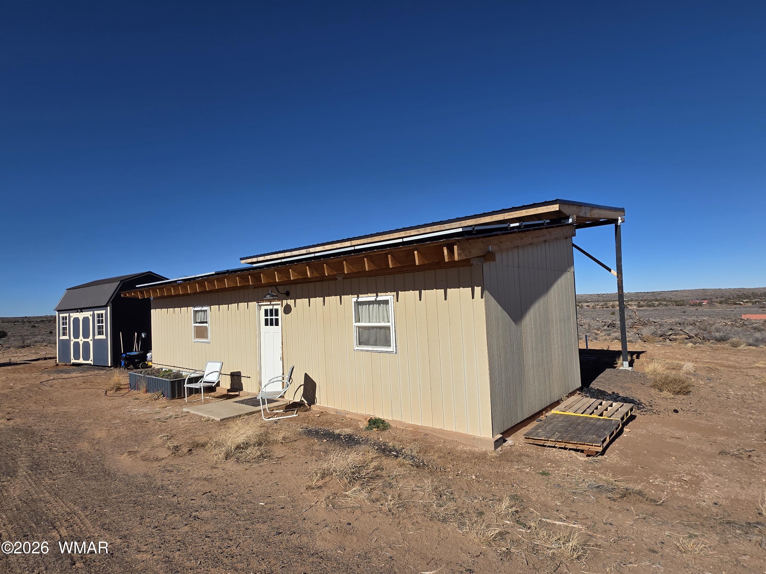 5057 Churchill Road Snowflake, AZ 85937 - Photo 71 of 115 a view of a house with a snow in the background