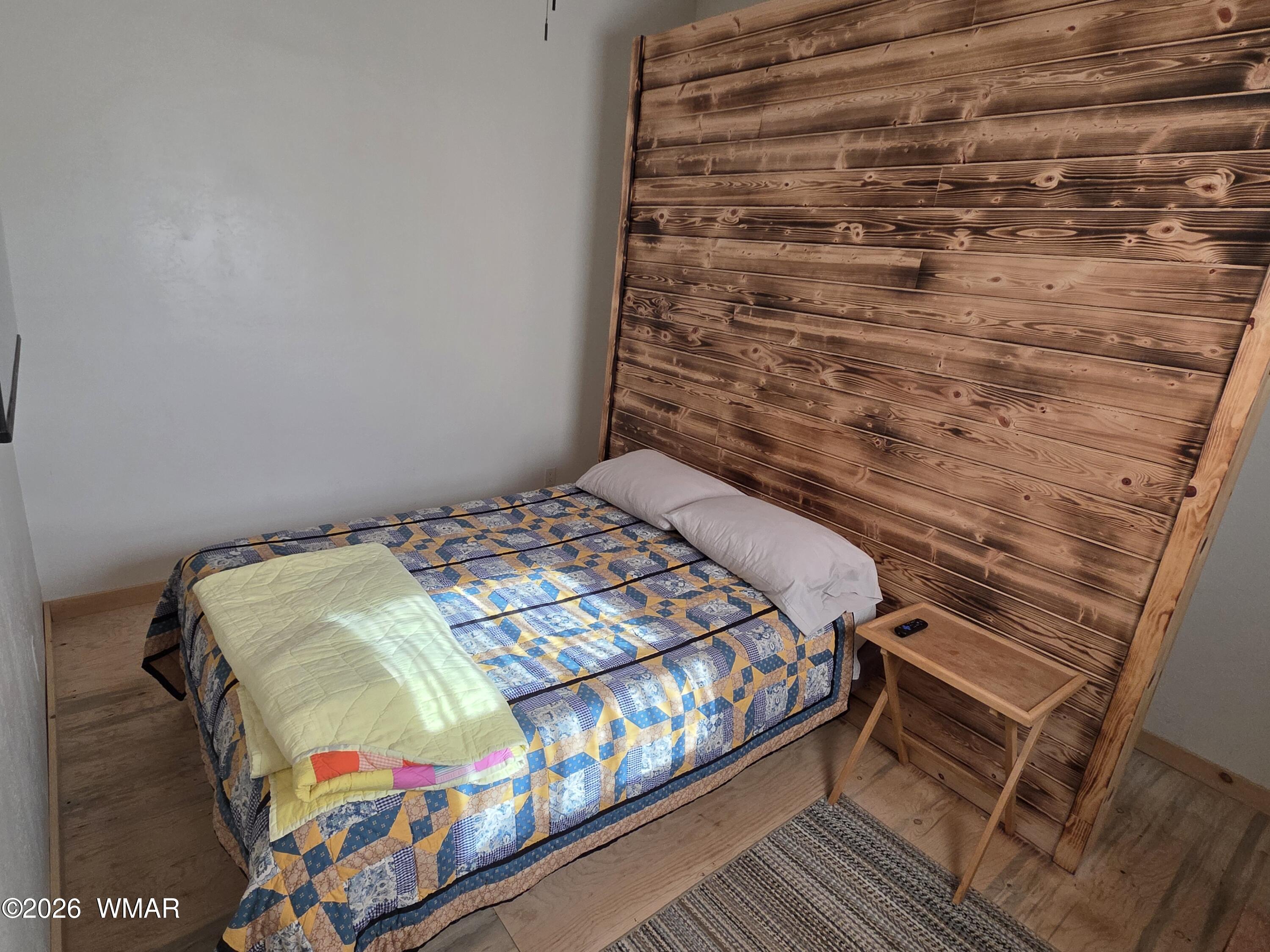 5057 Churchill Road Snowflake, AZ 85937 - Photo 80 of 115 a bedroom with a bed and a window
