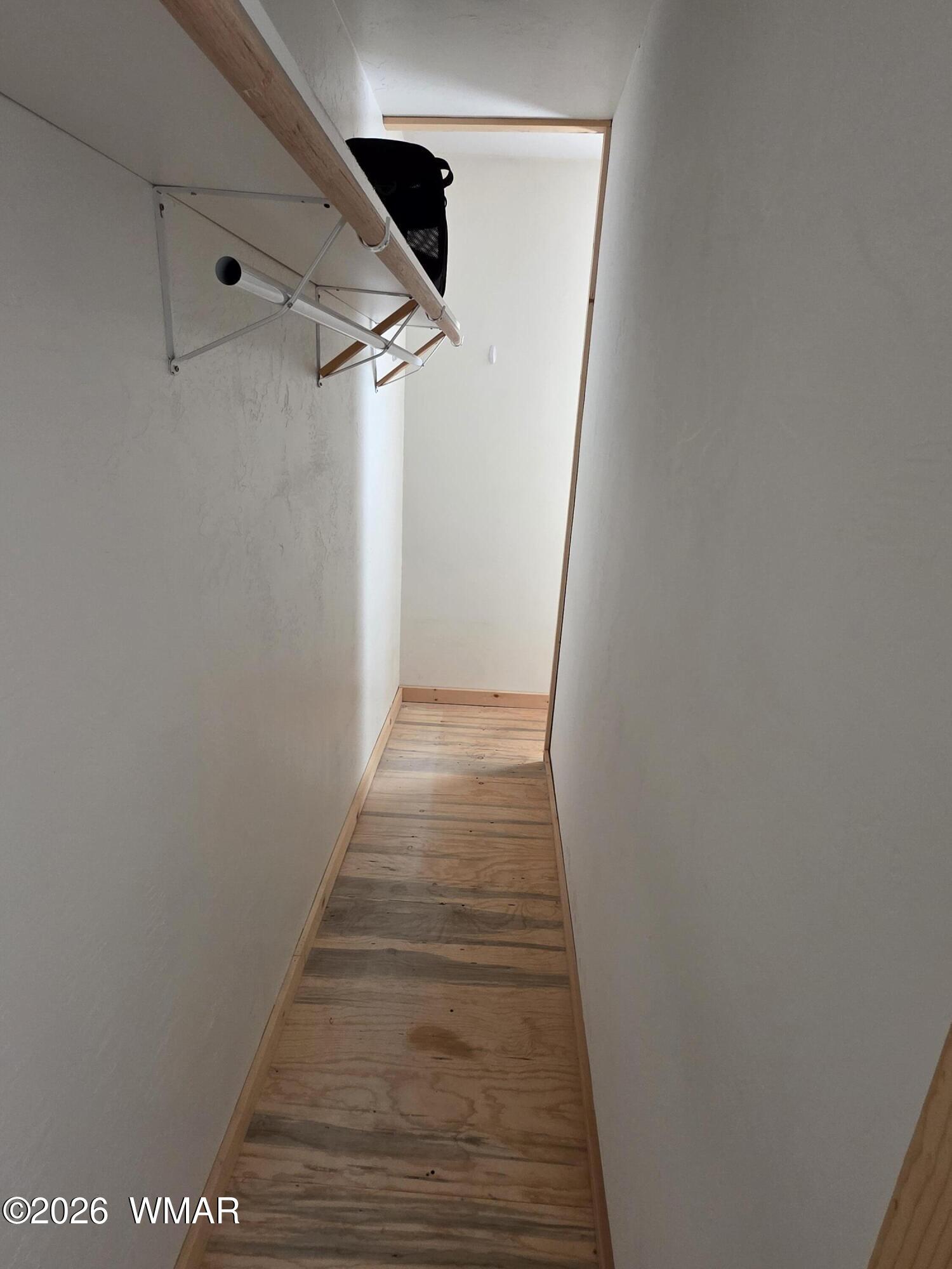 5057 Churchill Road Snowflake, AZ 85937 - Photo 83 of 115 a view of a hallway with wooden floor and staircase