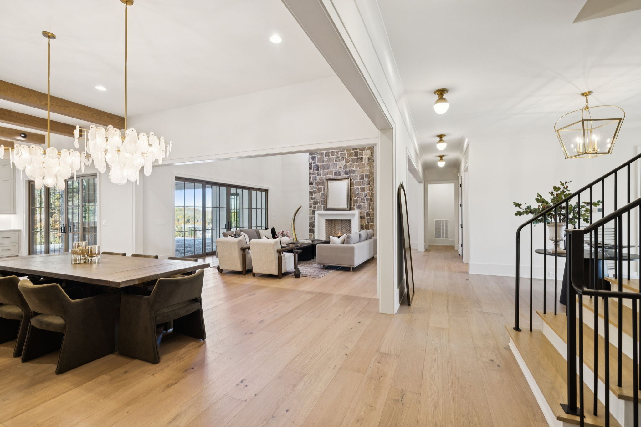 8101 Heirloom Boulevard College Grove, TN 37046 - Photo 14 of 81 a living room with lots of furniture and a chandelier