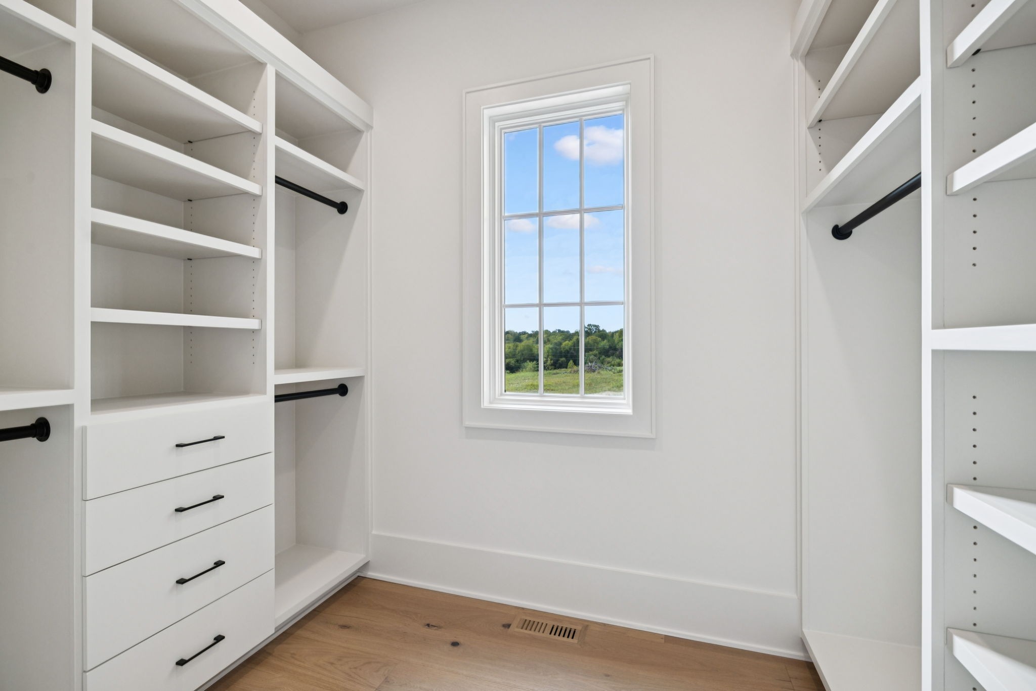 8101 Heirloom Boulevard College Grove, TN 37046 - Photo 35 of 81 a view of an empty room with cabinet and window