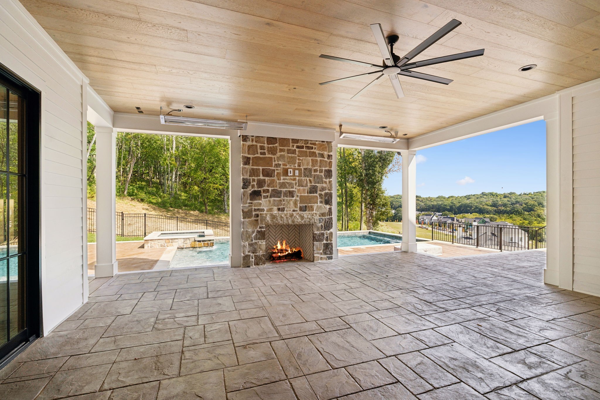 8101 Heirloom Boulevard College Grove, TN 37046 - Photo 68 of 81 a view of a livingroom with fireplace and a ceiling fan