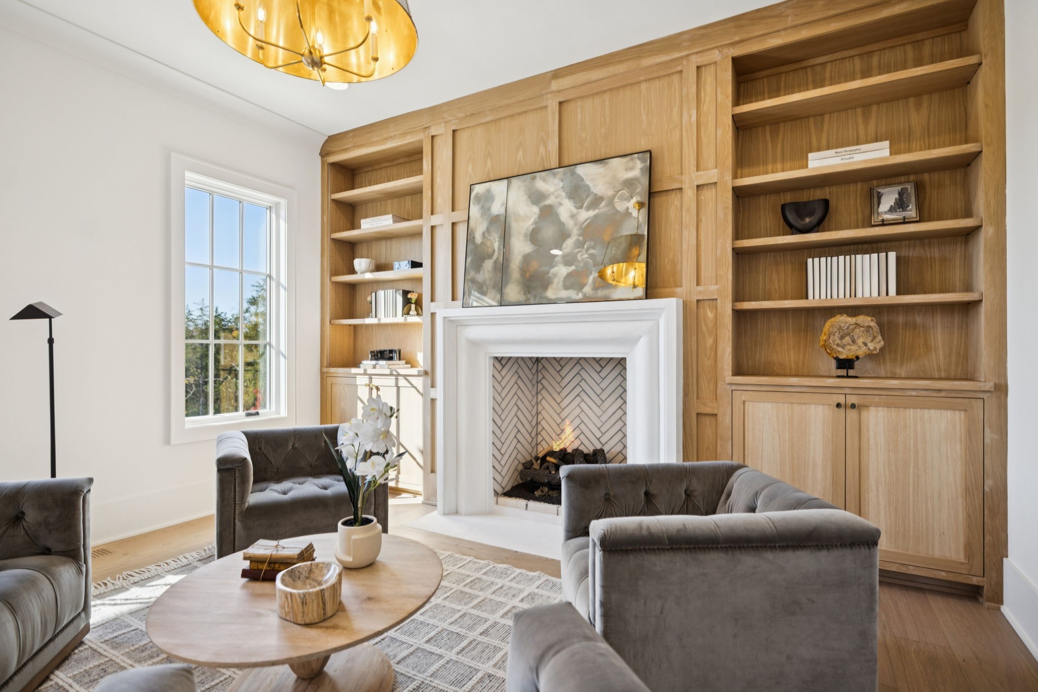 8101 Heirloom Boulevard College Grove, TN 37046 - Photo 10 of 81 a living room with furniture and a fireplace