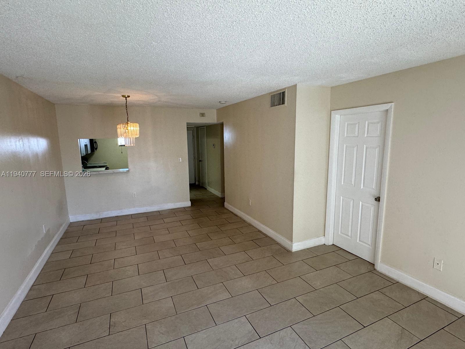 11307 Southwest 200th Street, Unit 310B Miami, FL 33157 - Photo 6 of 14 a view of a livingroom with a staircase