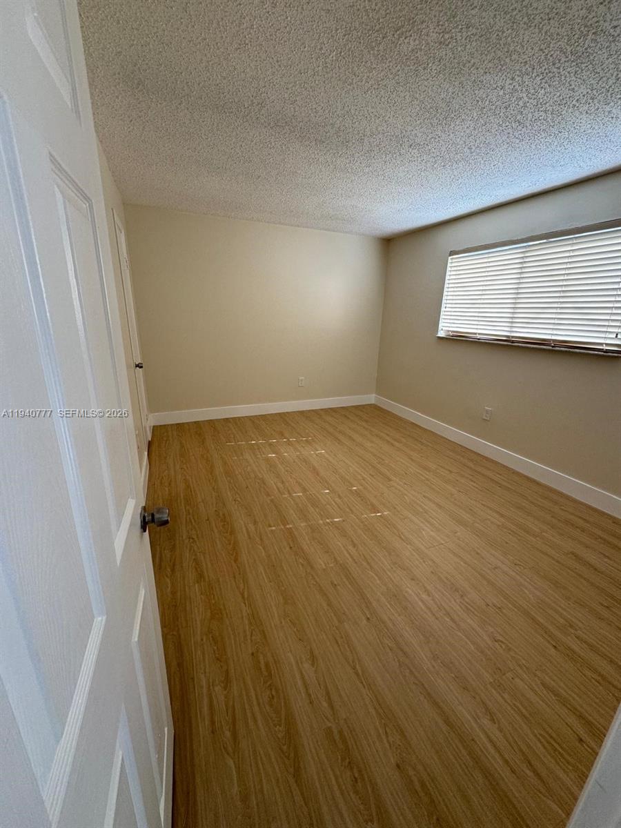 11307 Southwest 200th Street, Unit 310B Miami, FL 33157 - Photo 8 of 14 a view of an empty room