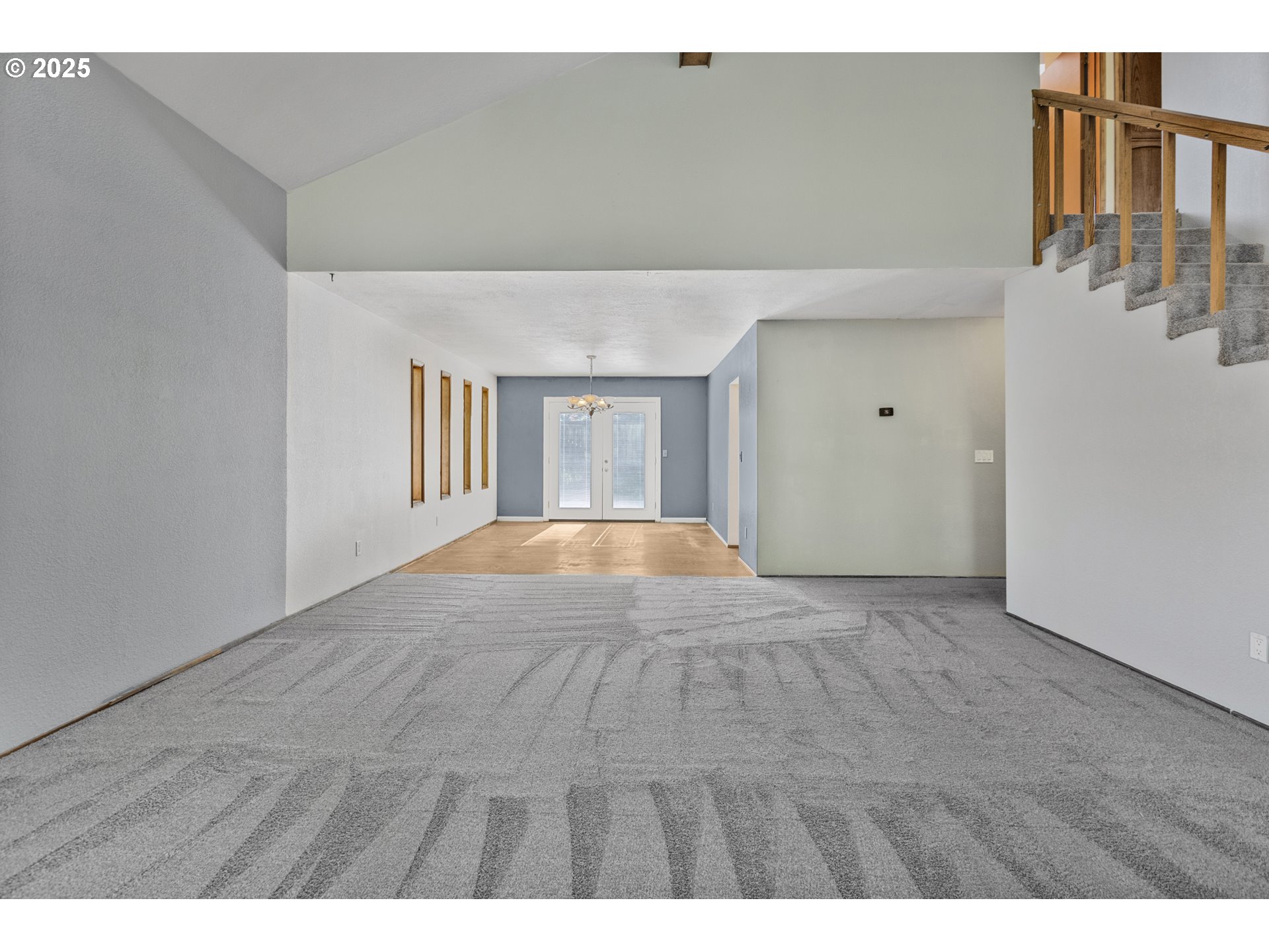 2641 Northwest Crocker Lane Albany, OR 97321 - Photo 13 of 47 a view of an empty room with wooden floor