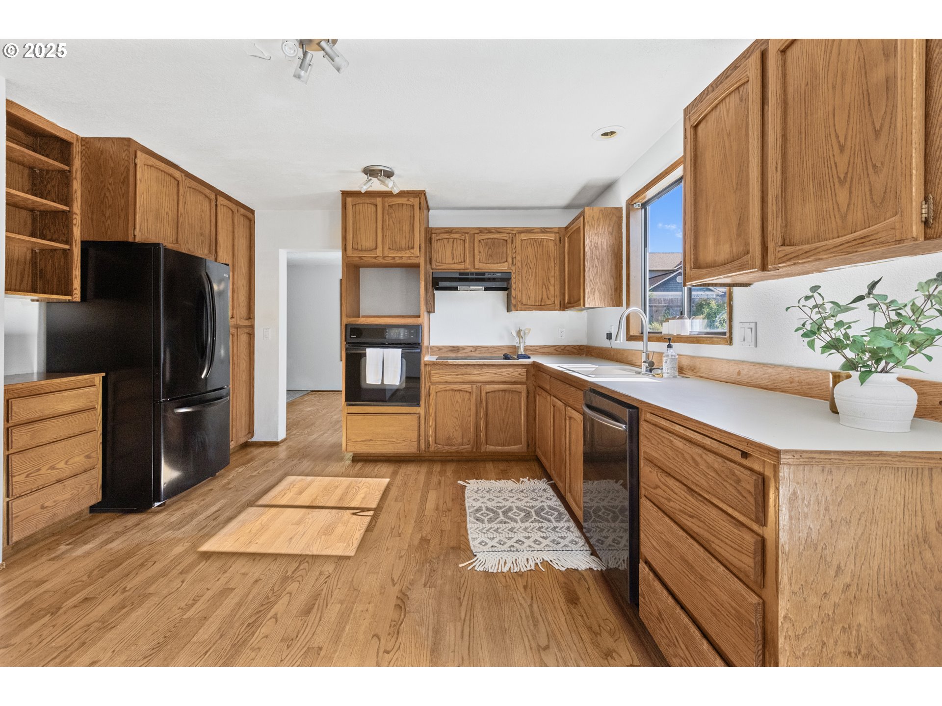 2641 Northwest Crocker Lane Albany, OR 97321 - Photo 21 of 47 a kitchen with stainless steel appliances granite countertop a sink counter space and cabinets