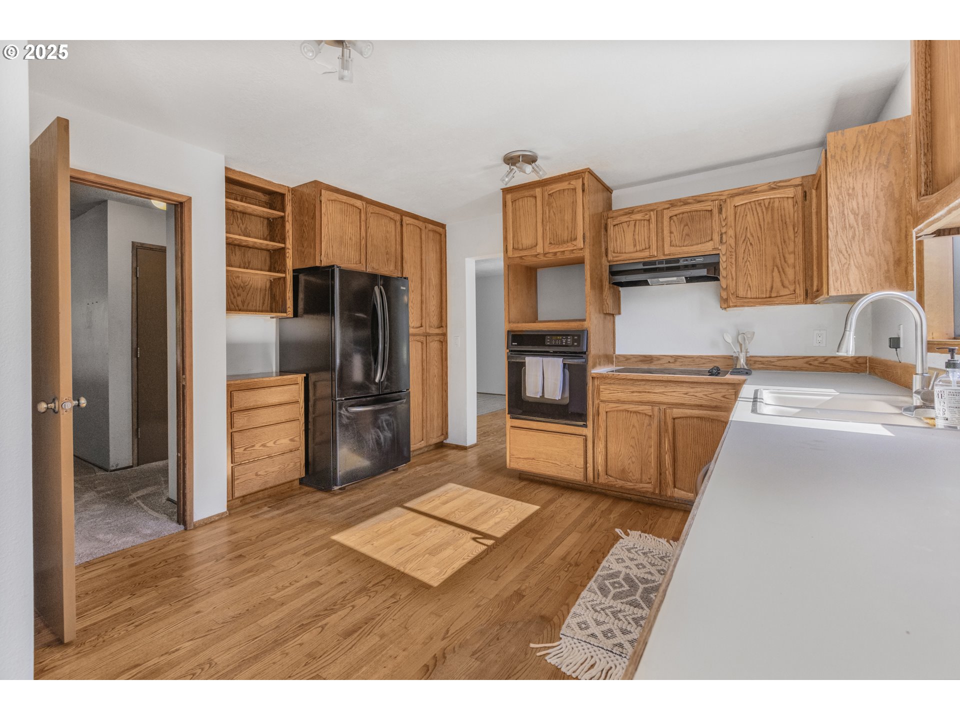 2641 Northwest Crocker Lane Albany, OR 97321 - Photo 22 of 47 a kitchen with stainless steel appliances a refrigerator and a sink