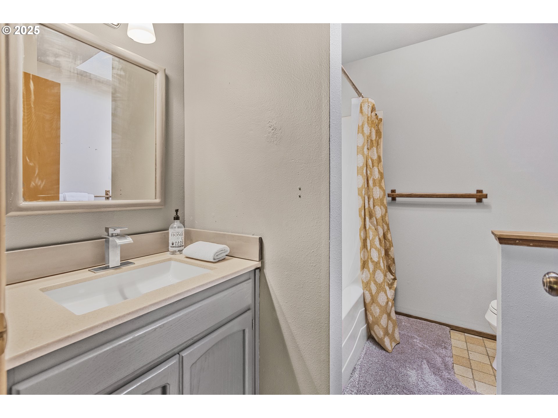 2641 Northwest Crocker Lane Albany, OR 97321 - Photo 31 of 47 a bathroom with a sink and a mirror