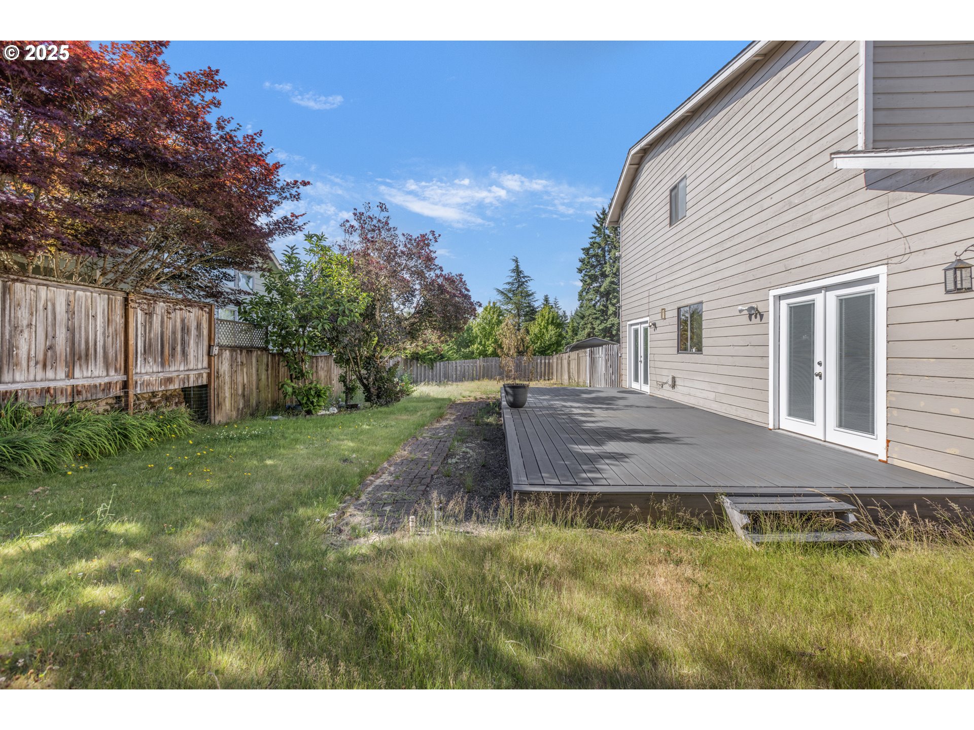 2641 Northwest Crocker Lane Albany, OR 97321 - Photo 40 of 47 a view of an house with backyard and trees