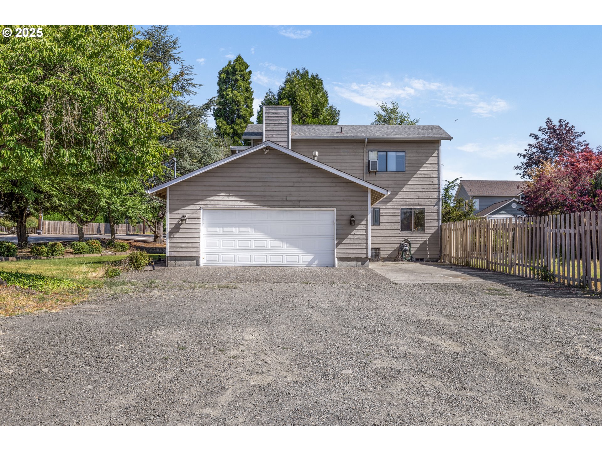 2641 Northwest Crocker Lane Albany, OR 97321 - Photo 6 of 47 a view of a house with backyard and trees