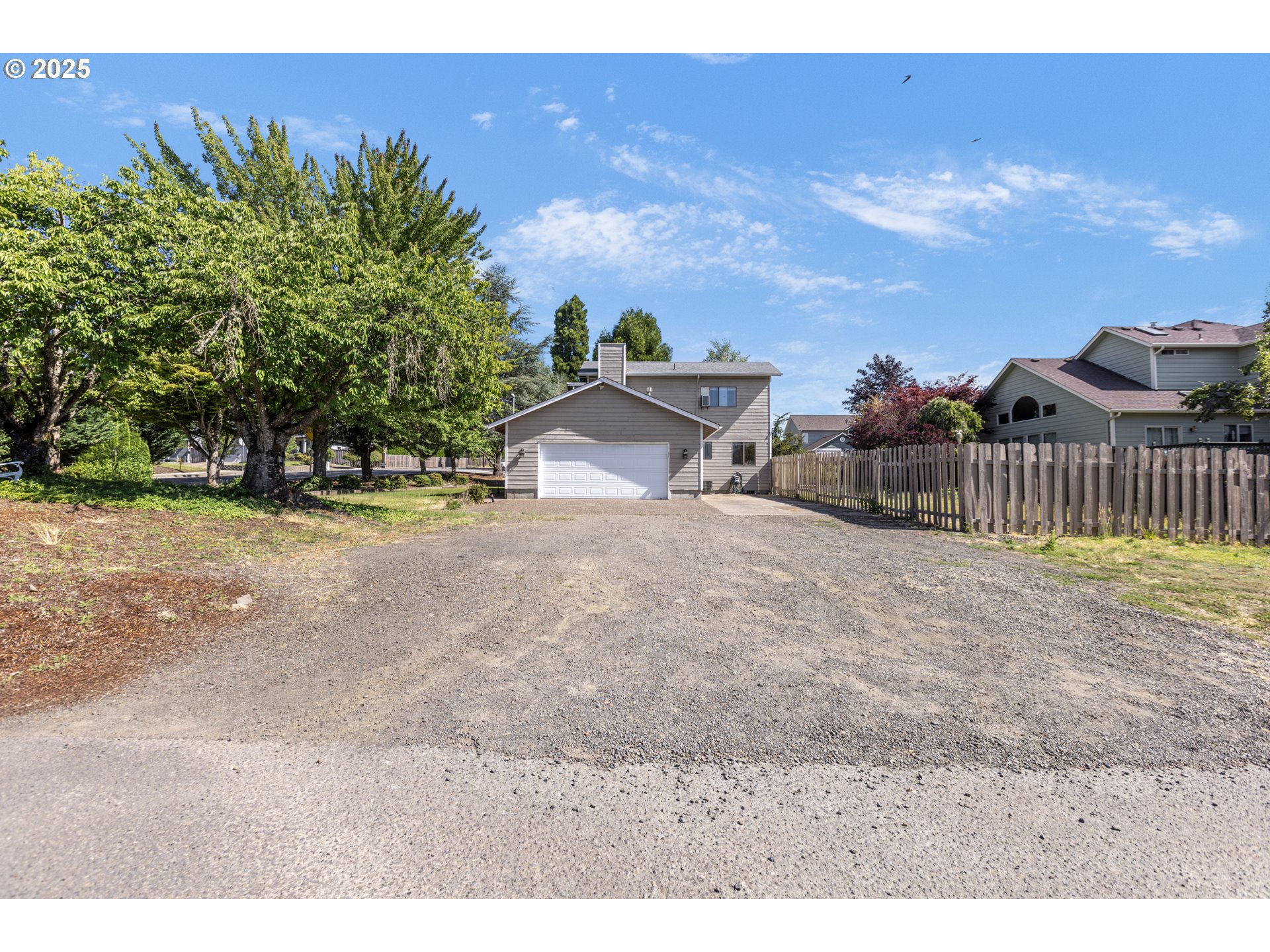 2641 Northwest Crocker Lane Albany, OR 97321 - Photo 7 of 47 a backyard of a house with table and chairs