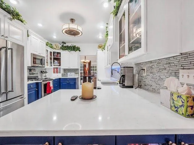 a kitchen with stainless steel appliances