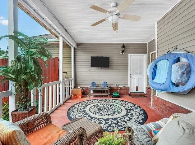 a view of a swimming pool with lake and trees in the back