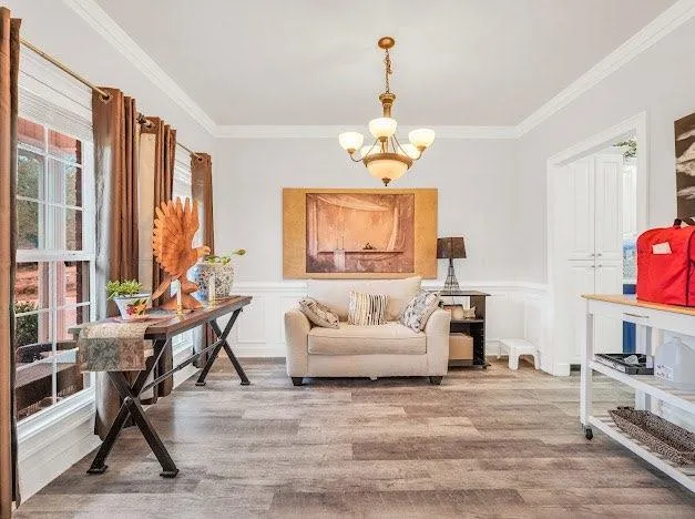 a living room with fireplace furniture and a flat screen tv