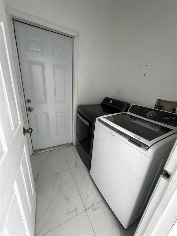 10130 Spring Hill Drive Spring Hill, FL 34608 - Photo 20 of 33 a utility room with closet