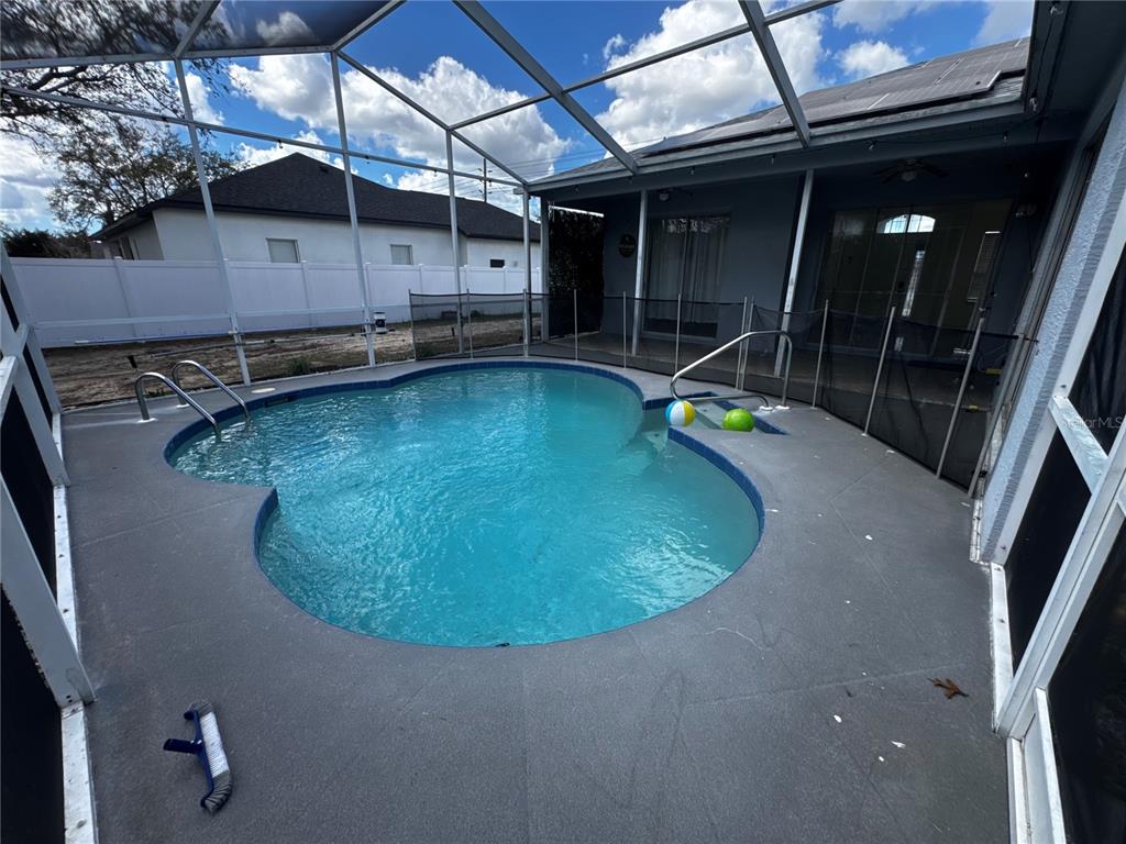 10130 Spring Hill Drive Spring Hill, FL 34608 - Photo 28 of 33 an outdoor view of a swimming pool