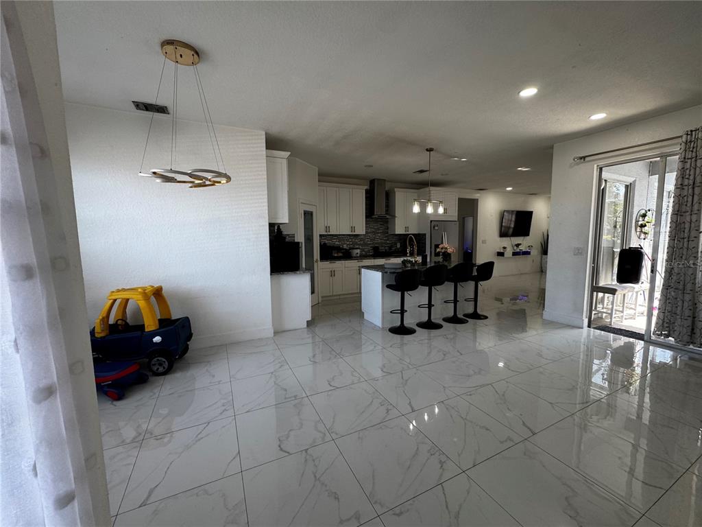 10130 Spring Hill Drive Spring Hill, FL 34608 - Photo 7 of 33 a view of a livingroom with furniture and furniture