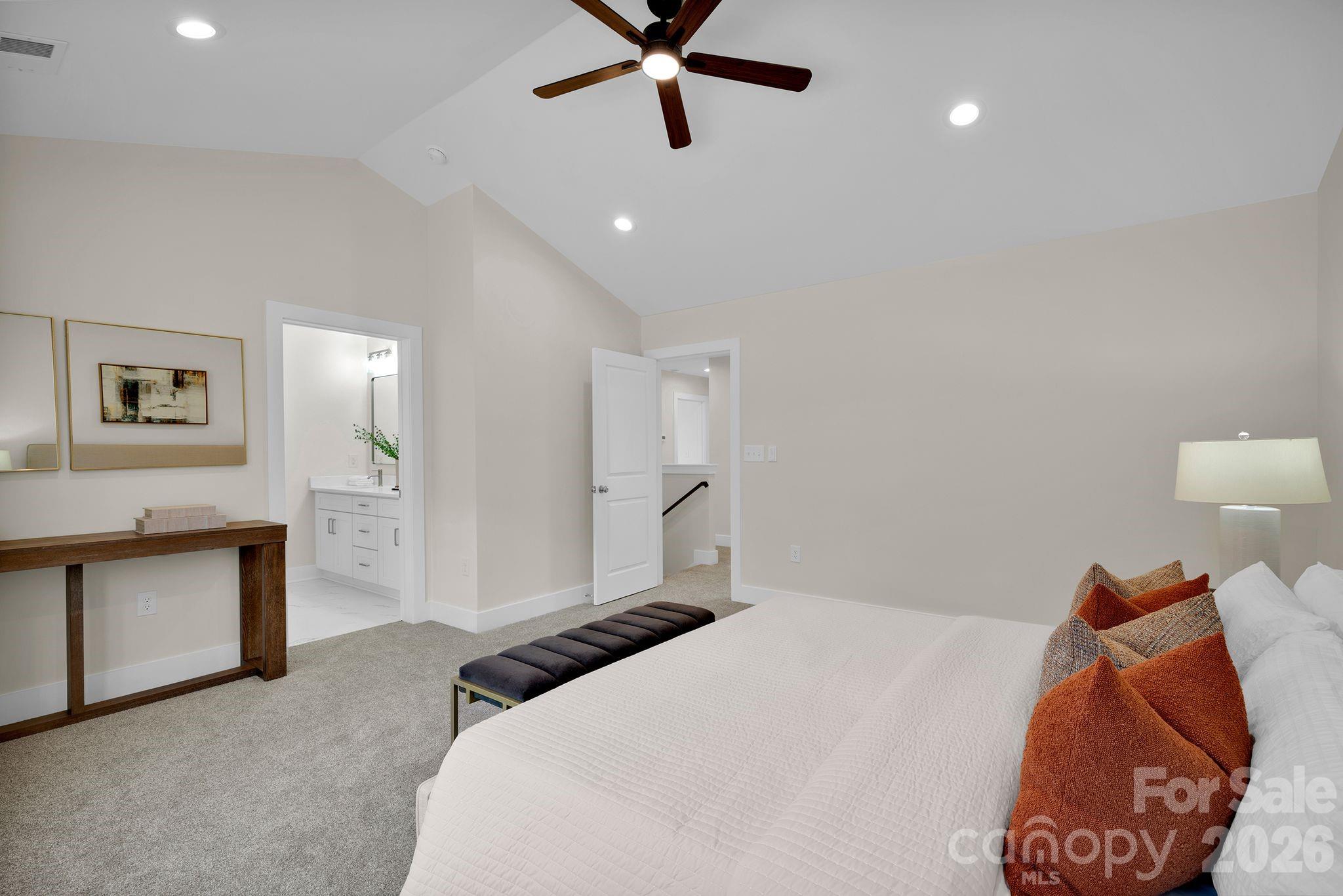 9050 Unity Church Road Mooresville, NC 28115 - Photo 16 of 32 a bedroom with a bed and cabinets