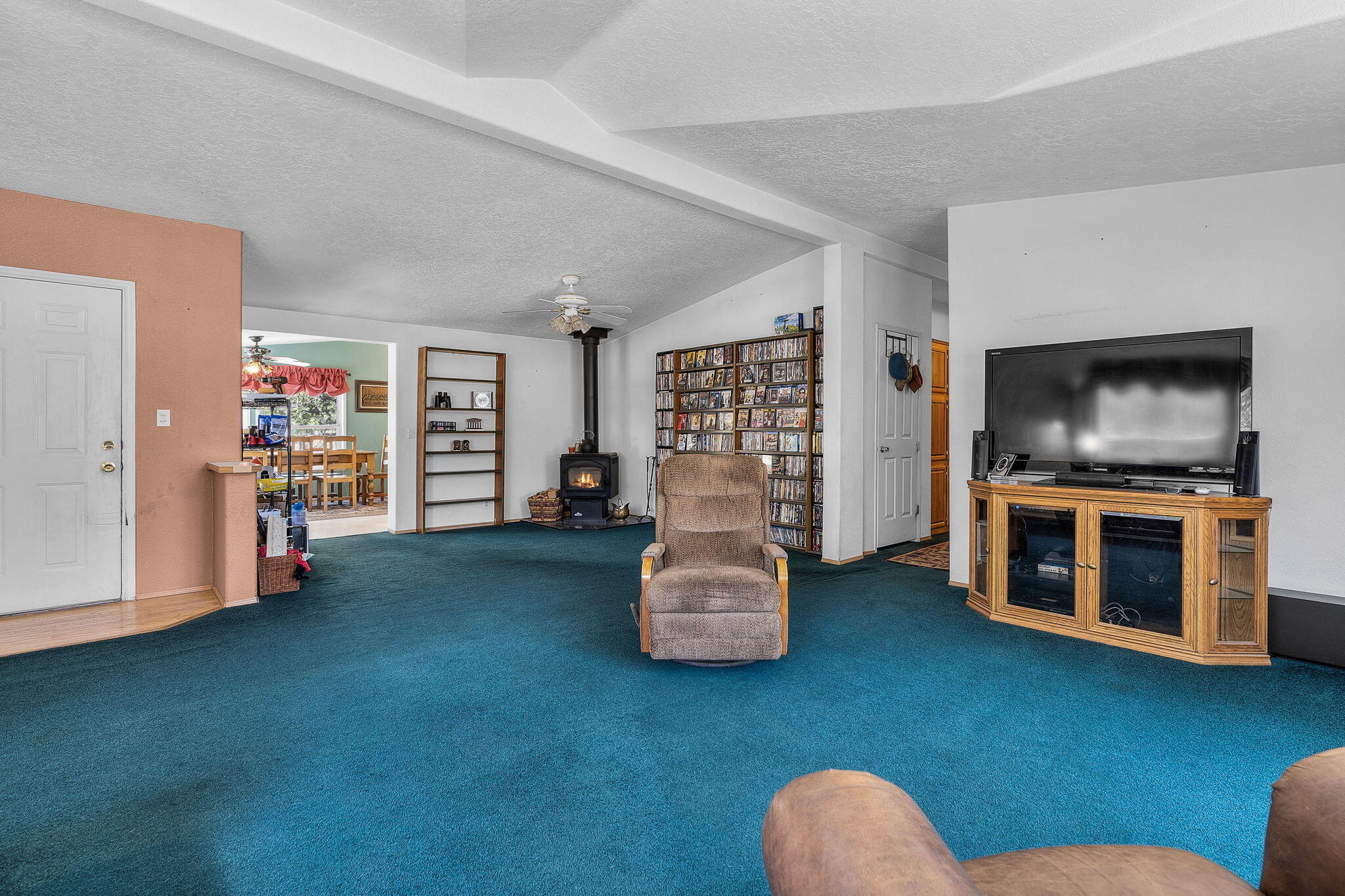 5638 Southwest Shad Road Terrebonne, OR 97760 - Photo 7 of 43 Keeping room or den with Wood burning fireplace