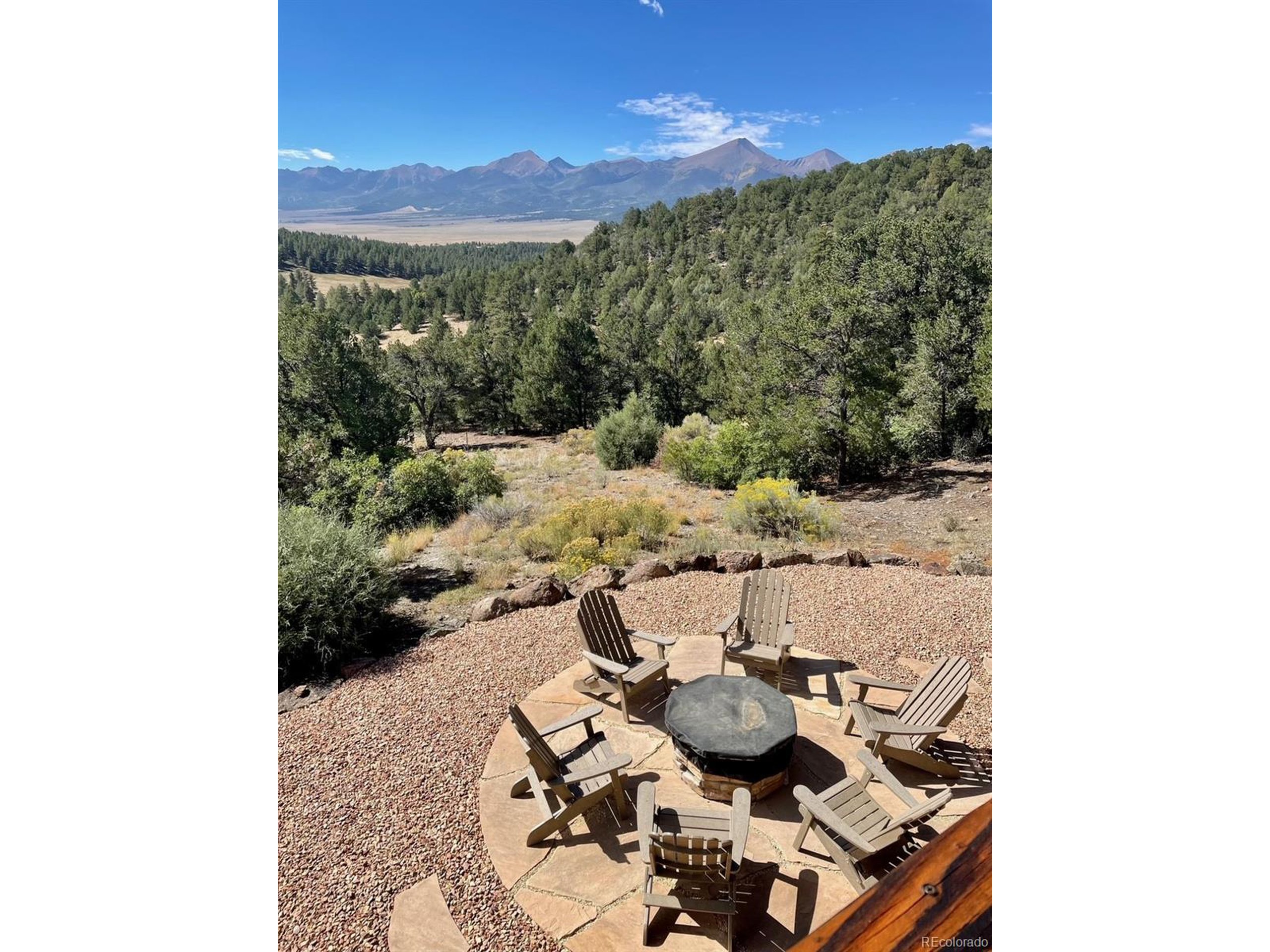 200 Moffat Road Cotopaxi, CO 81223 - Photo 40 of 42 a view of a balcony with furniture and a garden
