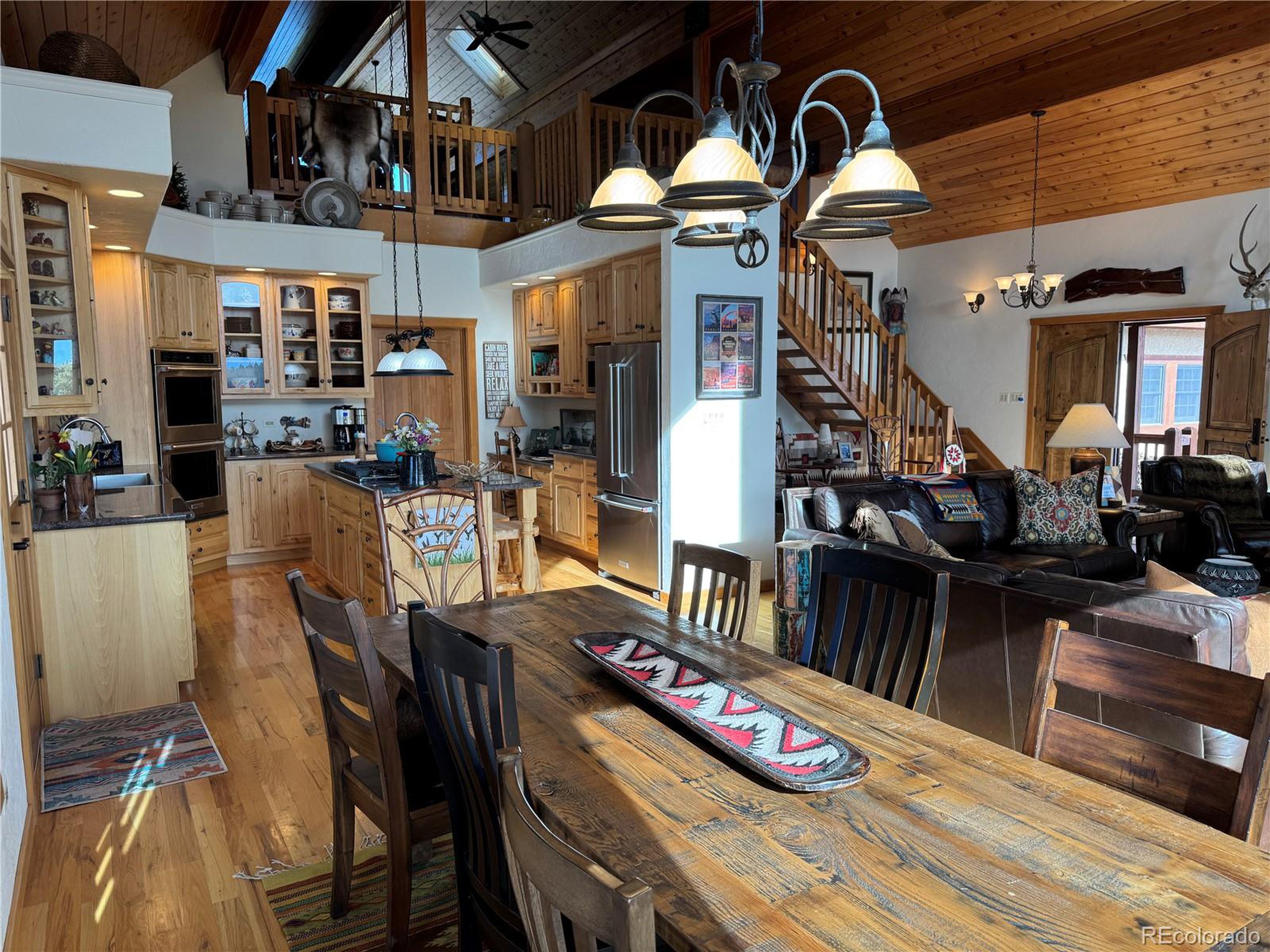 200 Moffat Road Cotopaxi, CO 81223 - Photo 4 of 42 a view of a dining room with furniture