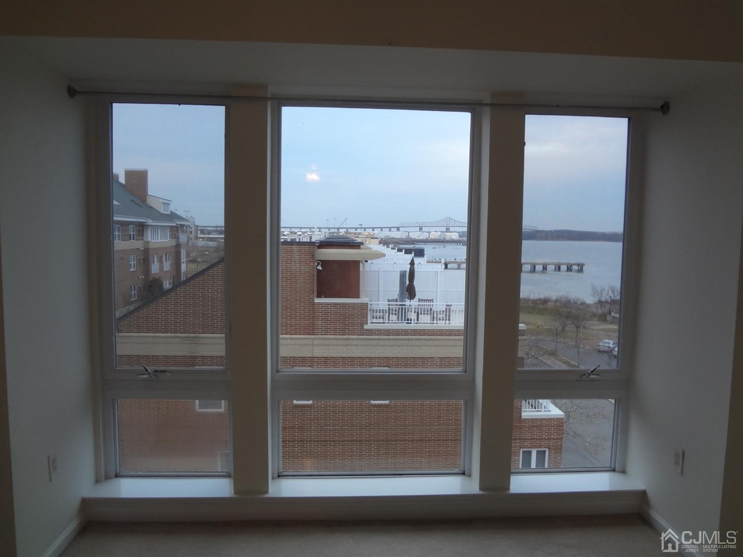 358 Rector Street, Unit 511 Perth Amboy, NJ 08861 - Photo 20 of 29 a view of a glass door of the house