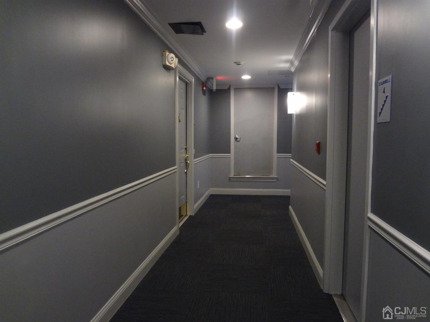 358 Rector Street, Unit 511 Perth Amboy, NJ 08861 - Photo 6 of 29 a view of hallway with stairs
