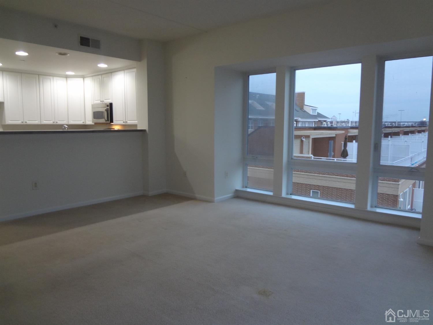 358 Rector Street, Unit 511 Perth Amboy, NJ 08861 - Photo 8 of 29 a view of an empty room with a window